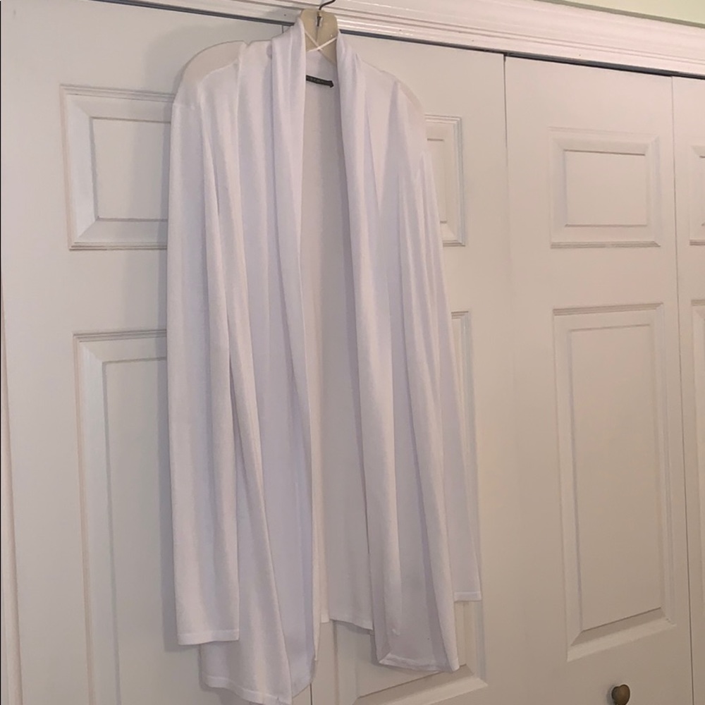 Long sleeve white cardigan.